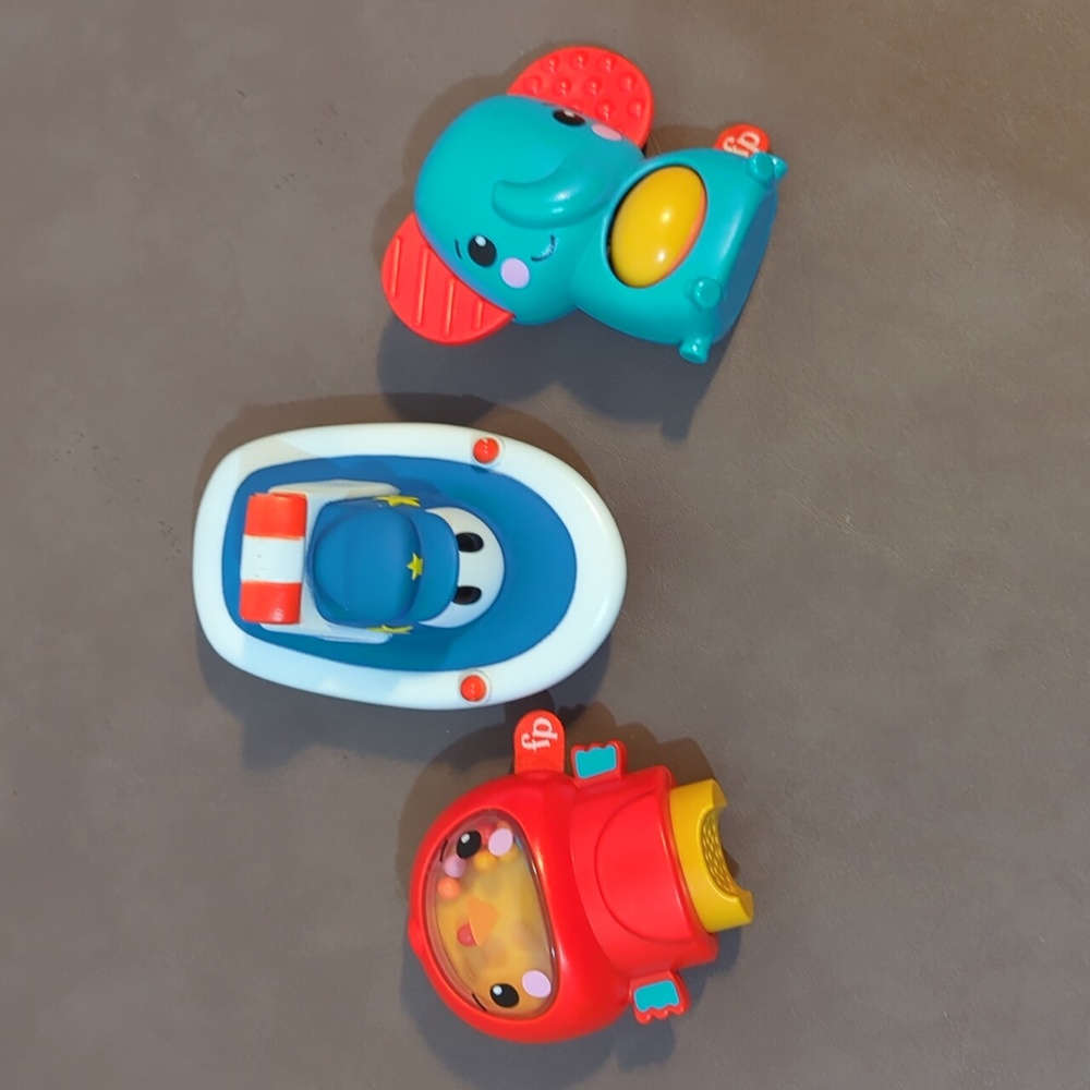 Fisher Price Fidget buddies activity toy Nuby bath toy boat roller squeaker
